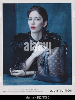 poster advertising Louis Vuitton with Julia Nobis in paper magazine from  2014 year, advertisement, creative LV Louis Vuitton 2010s advert Stock  Photo - Alamy