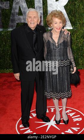 Kirk Douglas and Anne Buydens arriving at the Vanity Fair Oscar Party 2010, held at the Sunset Tower in Los Angeles, CA, USA on March 07, 2010. Photo by Mehdi Taamallah/ABACAPRESS.COM (Pictured: Kirk Douglas, Anne Buydens) Stock Photo