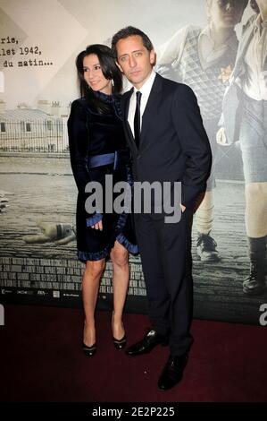 Gad Elmaleh and girlfriend Marie Drucker arriving for the premiere of 'La Rafle' held at the Gaumont Marignan theater in Paris, France on March 8, 2010. Photo by Nicolas Briquet/ABACAPRESS.COM Stock Photo