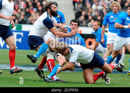 France's Sebastien Chabal and Dimitri Szazewski tackling Italy's Andrea Masi during the RBS Six Nations Rugby Tournament match, France vs Italy, in St-Denis, France, on March 14th, 2010. France won 46-20. Photo by Henri Szwarc/ABACAPRESS.COM Stock Photo