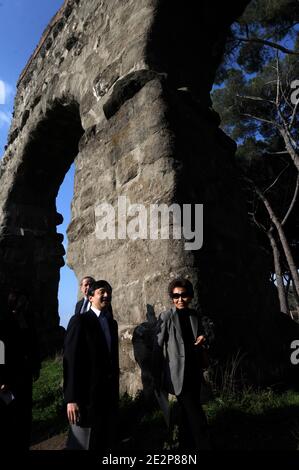 Japan's Crown Prince Naruhito accompanied by japanese author Nanami Shiono (R) visits the famous Via Appia (Ancient Appian Way) on the outskirts of Rome, Italy on March 14, 2010 during a one-day private visit. The Via Appia is also known as 'Regina viarum', the Queen of roads, both because of its great length and its remarkable beauty: on each side of the roadway houses, temples, mausoleums and an aqueduct were built, adding a touch of splendor to the enchanting simplicity of the Roman countryside. Prince Nahurito has a grand passion for ancient Rome. Photo by Eric Vandeville/ABACAPRESS.COM Stock Photo