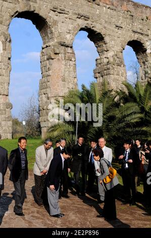 Japan's Crown Prince Naruhito accompanied by japanese author Nanami Shiono (R) visits the famous Via Appia (Ancient Appian Way) on the outskirts of Rome, Italy on March 14, 2010 during a one-day private visit. The Via Appia is also known as 'Regina viarum', the Queen of roads, both because of its great length and its remarkable beauty: on each side of the roadway houses, temples, mausoleums and an aqueduct were built, adding a touch of splendor to the enchanting simplicity of the Roman countryside. Prince Nahurito has a grand passion for ancient Rome. Photo by Eric Vandeville/ABACAPRESS.COM Stock Photo