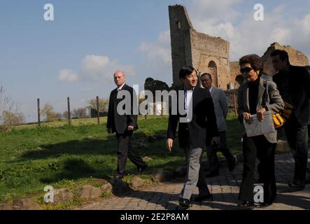 Japan's Crown Prince Naruhito accompanied by japanese author Nanami Shiono (R) visits the famous Via Appia (Ancient Appian Way) on the outskirts of Rome, Italy on March 14, 2010 during a one-day private visit. The Via Appia is also known as 'Regina viarum', the Queen of roads, both because of its great length and its remarkable beauty: on each side of the roadway houses, temples, mausoleums and an aqueduct were built, adding a touch of splendor to the enchanting simplicity of the Roman countryside. Prince Nahurito has a grand passion for ancient Rome. Photo by Eric Vandeville/ABACAPRESS.COM Stock Photo