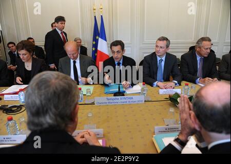 French President Nicolas Sarkozy attends meeting in presence of Junior ecology minister Chantal Jouanno, Minister for the Interior, Overseas Departments and Territorial Administration Brice Hortefeux and Minister for Agriculture, Fisheries and Food Bruno Le Maire at the Prefecture in La Rochelle, western France on March 16, 2010 about the consequences of storm dubbed 'Xynthia', which killed 52 people, unleashed gale force winds and torrential rains, destroying roads and houses along France's Atlantic coast. Photo by Mousse/ABACAPRESS.COM Stock Photo