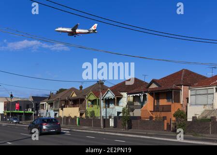 In the flight path at Sydenham with aircraft arriving to land at Sydney New South Wales Australia Stock Photo