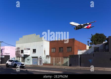 In the flight path at Sydenham with aircraft arriving to land at Sydney New South Wales Australia Stock Photo