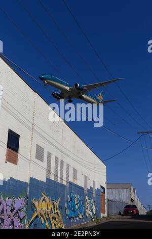 In the flight path at Sydenham with aircraft arriving to land at Sydney New South Wales Australia Stock Photo