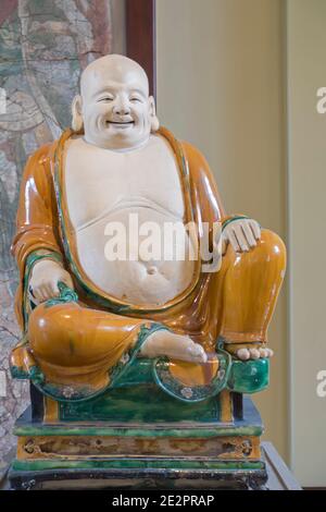 Statue of Budai Laughing Buddha, British Museum, London, England, UK Stock Photo