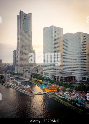 Yokohama skyline and Cosmoworld amusement park, as seen from the Cosmo Clock 21 Ferris wheel in Minato-Mirai, Yokohama, Kanagawa Prefecture, Japan. Stock Photo