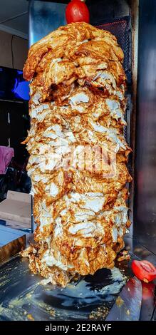 Closeup picture of stacked meat roasting, shawarma Stock Photo