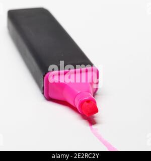 a pink luminous highlighter on white background Stock Photo