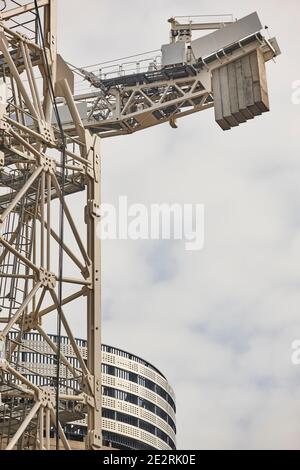 Telescopic crane under a white sky. Construction engineering industry Stock Photo