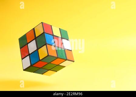 Rubik's cube on a colorful background Stock Photo