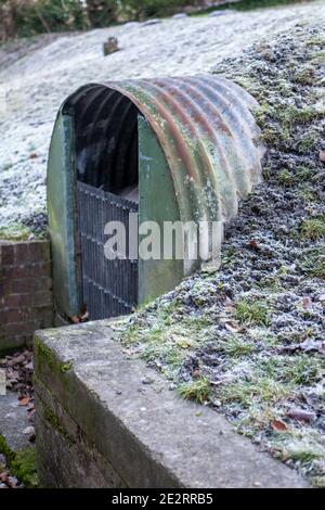 Abandoned Anderson shelter at the home of John Lewis, the founder of the general store in Hampshire. Stock Photo