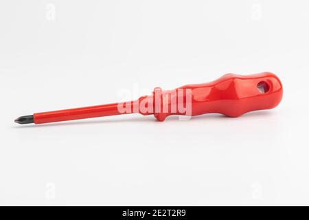 A red plastic insulated philips screwdriver Stock Photo
