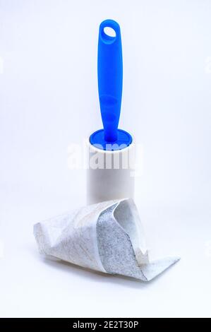 roller for cleaning clothes from wool, pet hair on clothes, Roller cleans clothes Stock Photo