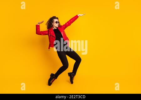 Full size profile side photo of cool girl raise hands dance look copyspace isolated over bright color background Stock Photo