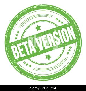 BETA VERSION text on green round grungy texture stamp. Stock Photo