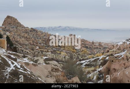 Uchisar fortress and homes from Pigeon Valley in Cappacodia,Turkey Stock Photo