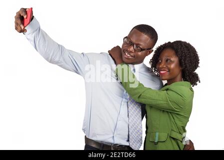 friends and office colleagues in formal outfit is happy and taking self portrait with smart phone isolated in studio Stock Photo