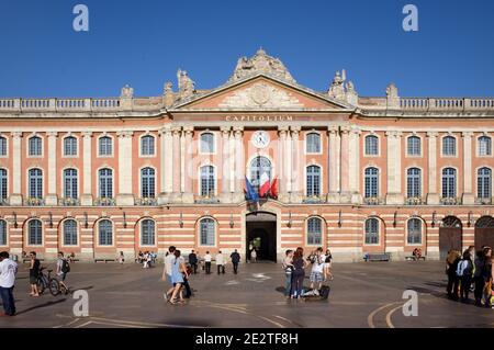 Tourists & Locals Mingle in the Capitole Town Square or Plaza with the Town Hall or City Hall, the Capitolium (1750-1760), Toulouse France Stock Photo