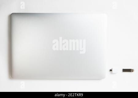 close up. laptop and flash card on a white background . Stock Photo