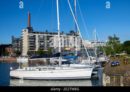 FINLAND, HELSINKI, JUL 02 2017, A boat anchoring in the harbor of Helsinki, Finland Stock Photo