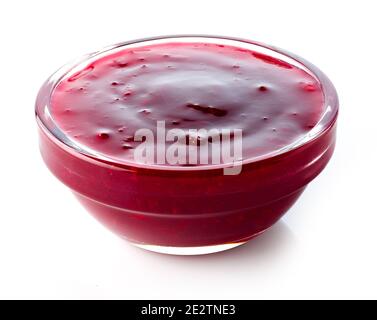 Cherry sauce in glass bowl isolated on white background Stock Photo