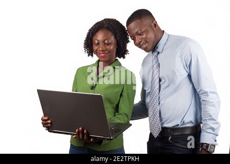 Man thinking looking into the laptop. Managers meeting. Idea, analysis marketing plans. Workplace concept, start up project with a female colleague Stock Photo
