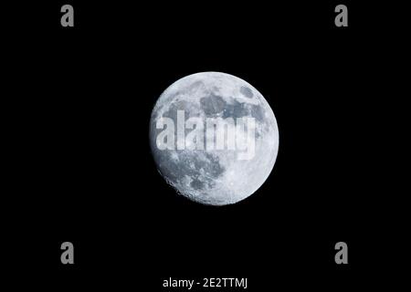Waxing gibbous moon from north London in winter, UK Stock Photo