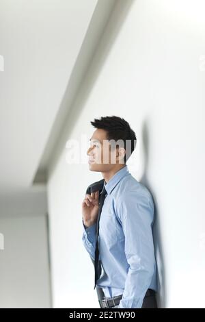 Portrait of young business man in corridor high quality photo Stock Photo