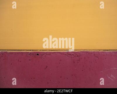 Weathered red and yellow wall Stock Photo