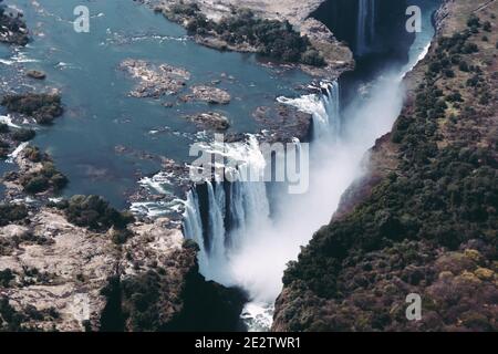 Victoria Falls Main Waterfall on the Zambezi River in Zimbabwe, Africa also called Mosi Oa Tunya, Aerial View Stock Photo