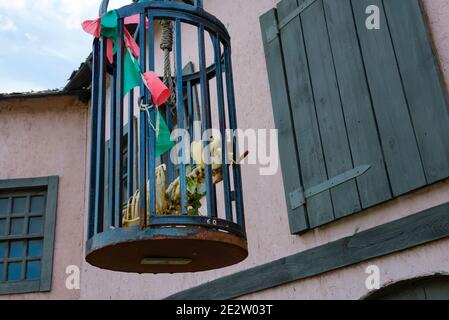 A dummy of the skeleton of a wild animal in a metal cage Stock Photo