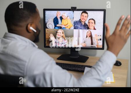 An African guy is talking via video call Stock Photo