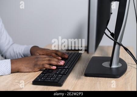 An intelligent African guy in shirt indoor Stock Photo