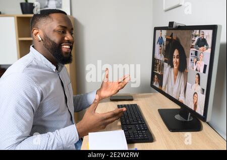An African guy is talking via video call Stock Photo