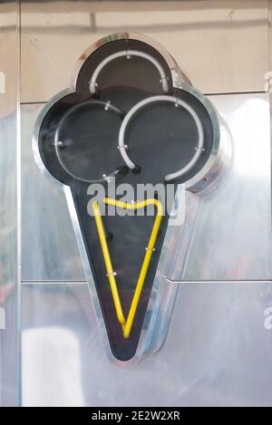 An ice cream neon sign unlit during the day on an ice cream parlour in Broadstairs, Isle of Thanet, Kent, United Kingdom Stock Photo