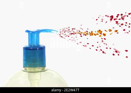 Plastic container with liquid soap spraying essence of petals isolated on white background Stock Photo