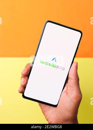 Assam, india - January 15, 2020 : Android Auto logo on phone screen stock image. Stock Photo