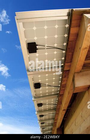 Photovoltaic panels on shed for electrical production. Stock Photo