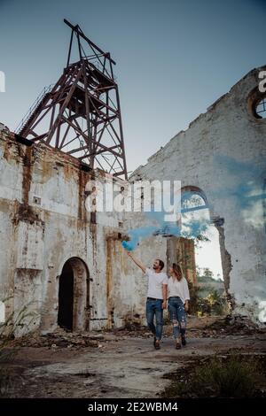 Couple with smoke flares. Concept of love. Stock Photo