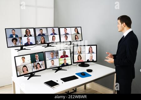 Elearning Training Presentation Using Videoconference With Virtual Audience Stock Photo