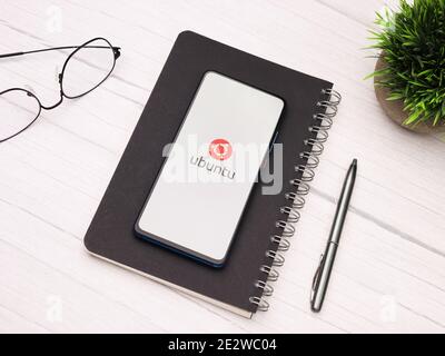 Assam, india - January 15, 2020 : Ubuntu logo on phone screen stock image. Stock Photo