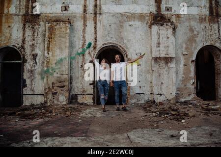 Couple with smoke flares. Concept of love. Stock Photo