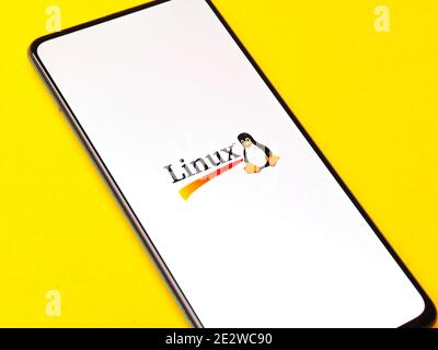 Assam, india - January 15, 2020 : Linux logo on phone screen stock image. Stock Photo