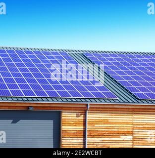 Photovoltaic panels on shed for electrical production. Stock Photo