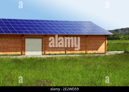 Photovoltaic panels on shed for electrical production. Stock Photo