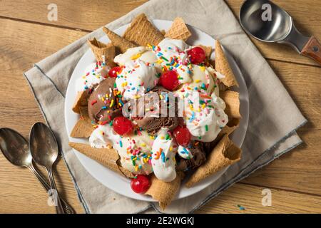 Homemade Ice Cream Sundae Nachos with Whipped Cream and Sprinkles Stock Photo