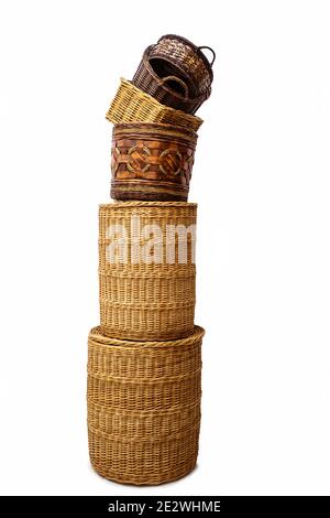 Stack of wicker straw handmade baskets for home storage Stock Photo